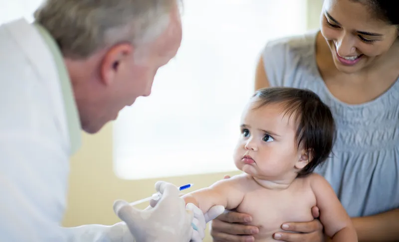 Baby Girl getting a Vaccination Shot