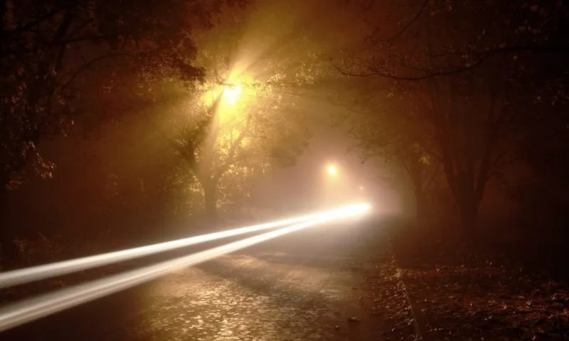 Long Exposure Car Light Trails – Foggy Road