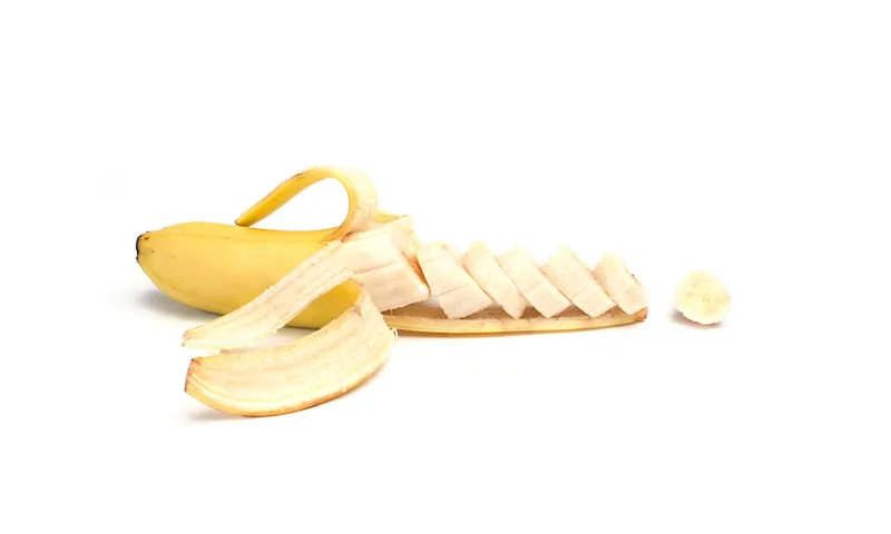 Close-Up Of Bananas Over White Background