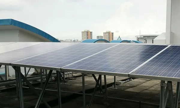 solar panels on an inner city roof getty