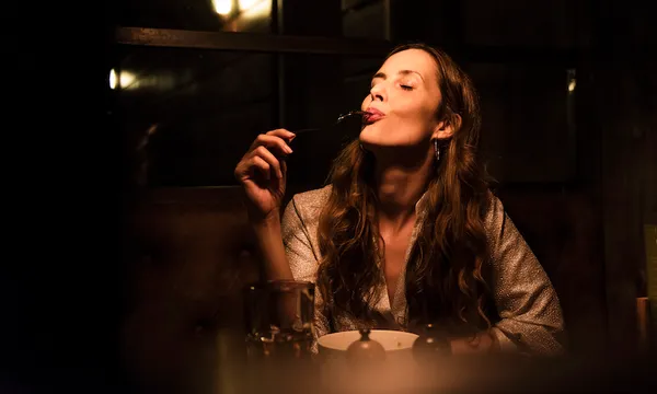 Woman enjoying dinner