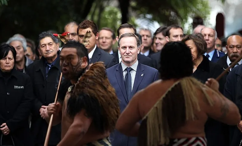 NGARUAWAHIA, NEW ZEALAND - AUGUST 20: New Zealand Prime Minister John Key accepts the challenge from Maori Chiefs at the coronation ceremony for the fourth year of rule of Maori King Tuheitia Paki at the Turangawaewae Marae on August 20, 2010 in Ngaruawahia, New Zealand. Paki succeeded his mother Dame Te Atairangikaahu following her death in August 2006, and was crowned and made successor the same day as his mother's funeral. (Photo by Hannah Peters/Getty Images)