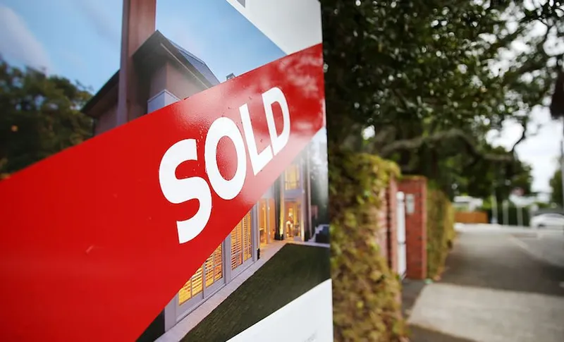 Auckland property house sold sign