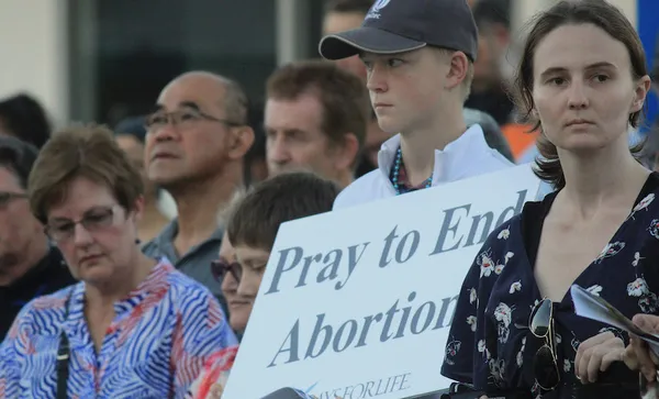 Abortion vigil detail on sign AB