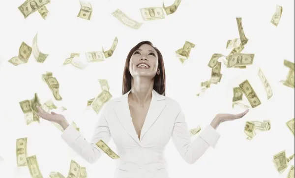 Money raining down on Asian businesswoman