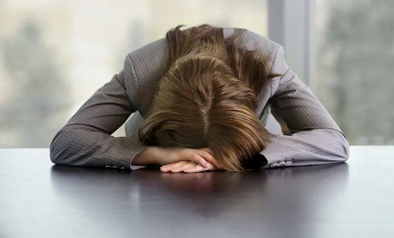 Bad day at the office – “defeated business person”