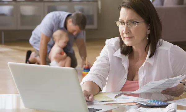 Woman paying bills on computer