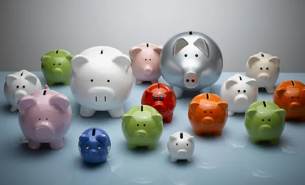 Multicolor piggy banks still life