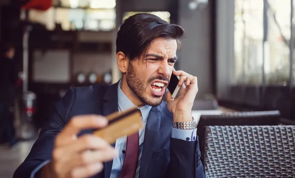 Man experiencing problems with his credit card