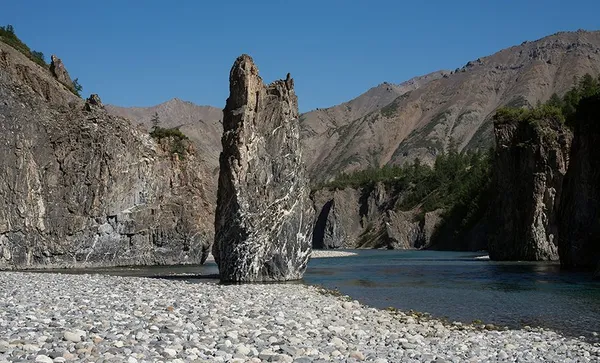 Own a rock in the middle of the riverbed.