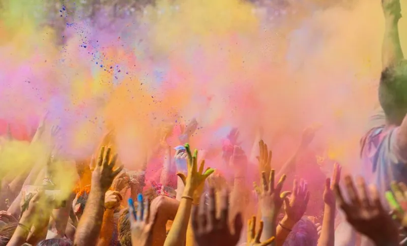 People celebrating the holi festival in Barcelona.