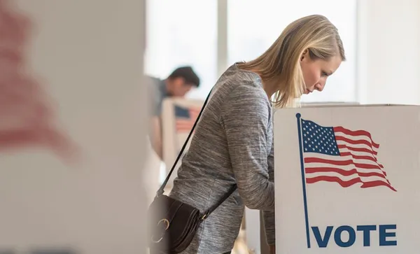 Woman voting on election day