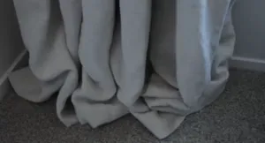 pay no attention to the sag beneath the curtain