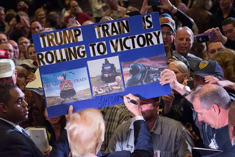 RENO, NV - FEBRUARY 23:  Republican presidential candidate Donald Trump greets supporters following a rally at the Nugget February 23, 2016 in Sparks, Nevada. The Nevada GOP caucus is tonight. (Photo by David Calvert/Getty Images)
