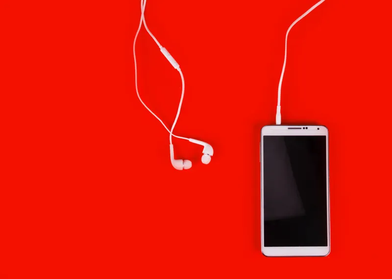 white earphones for using with digital music or  smart phone
