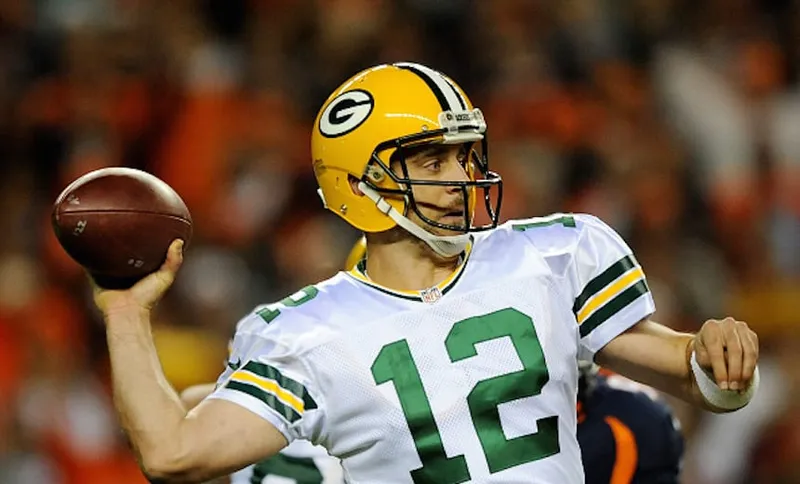 DENVER, CO - NOVEMBER 01: Quarterback Aaron Rodgers #12 of the Green Bay Packers looks to pass against the Denver Broncos in the second half of the game at Sports Authority Field at Mile High on November 1, 2015 in Denver, Colorado.  (Photo by Dustin Bradford/Getty Images)