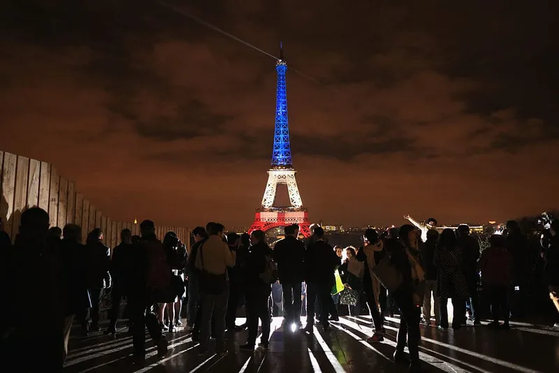 The Eiffel Tower, Paris, illuminated in Red, White and Blue in honour of the victims of the attacks. Photo by Christopher Furlong/Getty Images