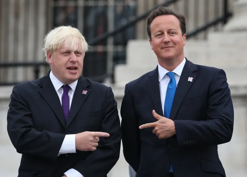 LONDON, ENGLAND - AUGUST 24:  Prime Minister David Cameron (R) stands with London Mayor Boris Johnson as the Olympic cauldron is lit for the Paralympic Games in Trafalgar Square on August 24, 2012 in London, England. The London 2012 Paralympic Games open on August 29, 2012 for 12 days.  (Photo by Peter Macdiarmid/Getty Images)