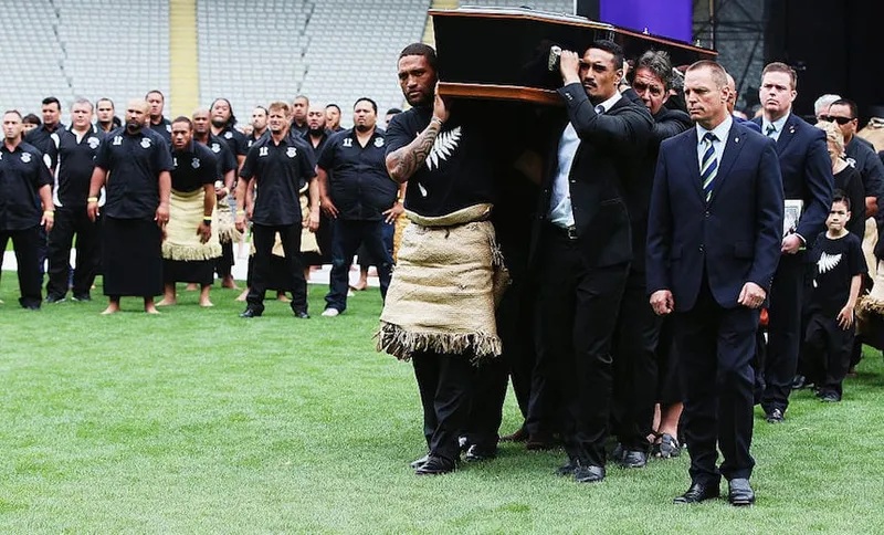 AUCKLAND, NEW ZEALAND - NOVEMBER 30:  (L-R) Rugby League player Manu Vatuvei and All Blacks player Jerome Kaino carry the casket carrying Jonah Lomu from the Public Memorial for Jonah Lomu at Eden Park on November 30, 2015 in Auckland, New Zealand.  (Photo by Hannah Peters/Getty Images)
