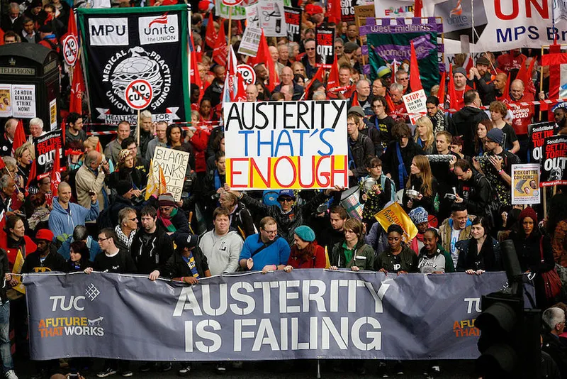 Demonstrators take part in a march against the UK government's austerity measures October, 2012. (Warrick Page/Getty Images)