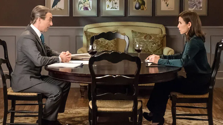 Alan Cumming as Eli Gold and Julianna Margulies as Alicia Florrick
