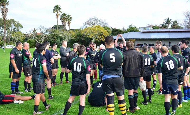 JEREMY, FACING CAMERA, AND THE NZ FALCONS PREPARE FOR A GAME. PHOTO: SUPPLIED