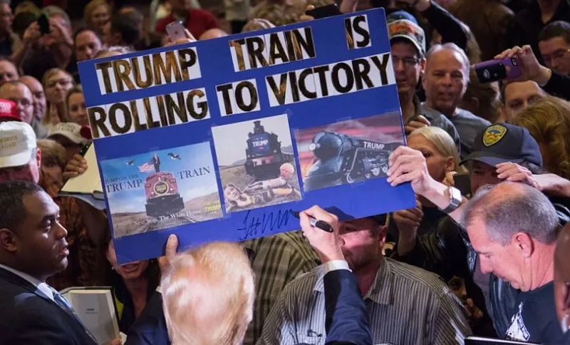 RENO, NV - FEBRUARY 23: Republican presidential candidate Donald Trump greets supporters following a rally at the Nugget February 23, 2016 in Sparks, Nevada. The Nevada GOP caucus is tonight. (Photo by David Calvert/Getty Images)