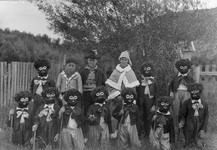 Somewhat astonishing Waiuta School production, c1933. It represents the Dutch celebration of Sinterklaas, when St Nicholas arrives accompanied by Zwart Piet and his black assistants.