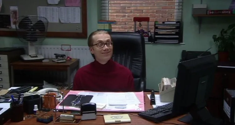 Let's just say he's holding a pen