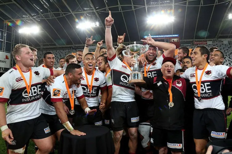 North Harbour players celebrate for the first time since winning the 1987 NPC second division. (Photo by Dianne Manson/Getty Images)