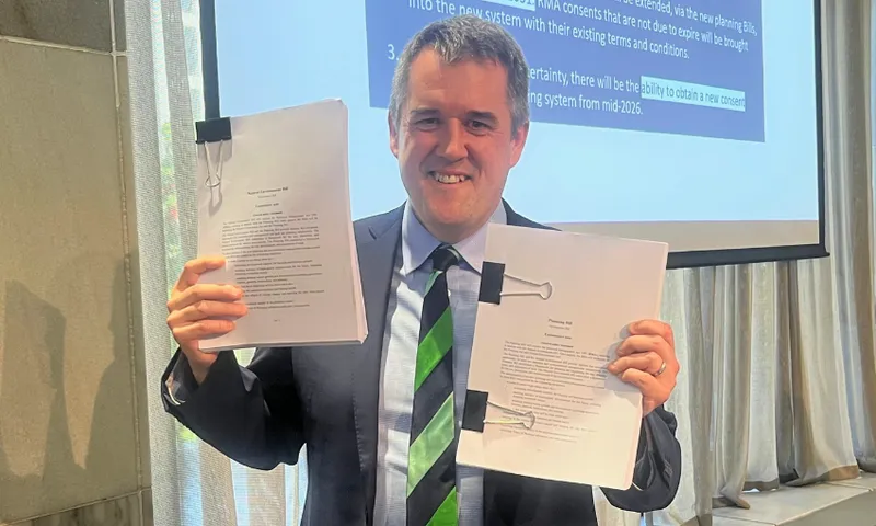 RMA minister Chris Bishop hold the Planning and Natural Environment Bills.
