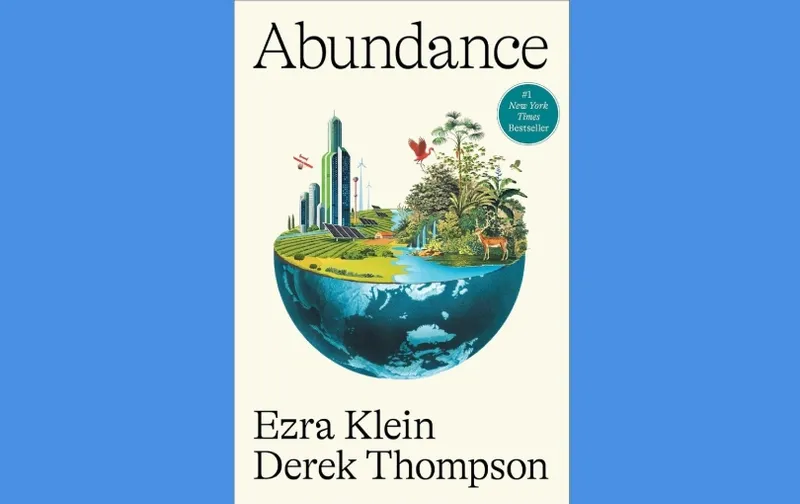 The cover of the book "Abundance" by Ezra Klein and Derek Thompson features a city and nature scene atop a half-sphere Earth, with buildings, trees, animals, and a blue sky on a cream background. A green sticker notes it's a bestseller.