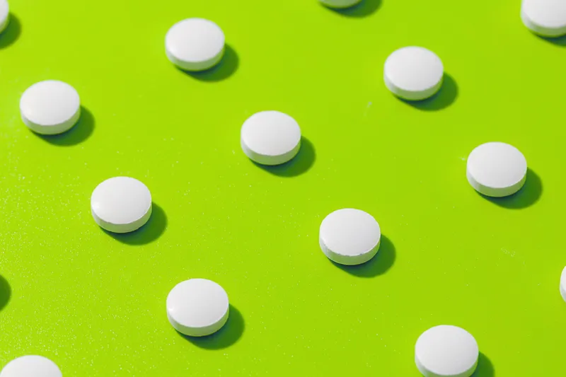 Square grid of tablets against a green background