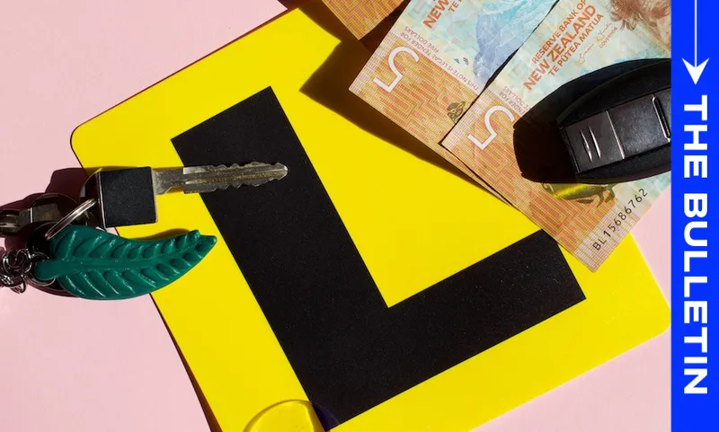 A learner driver’s L-plate, car keys with a green leaf keychain, New Zealand banknotes, and a section of a banner reading "THE BULLETIN" on a pink background.