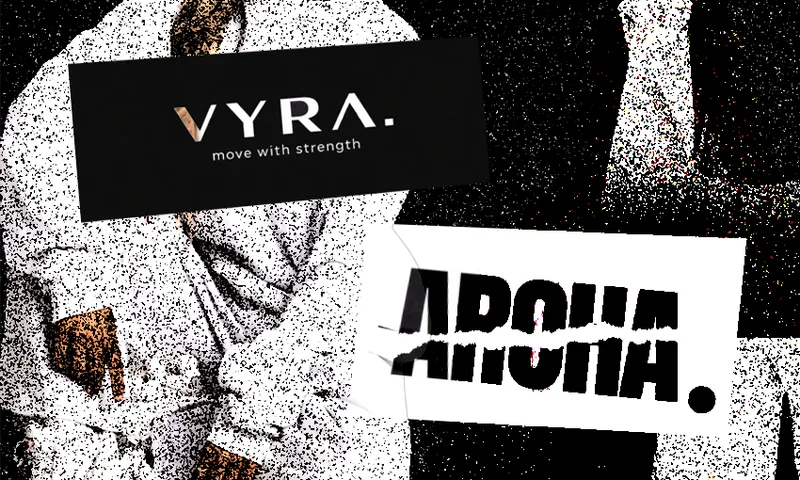 A grainy, black-and-white image with two overlapping signs: one says “VYRA. move with strength” on a dark background, and the other, partially torn, says “ARONA.” on a white background.