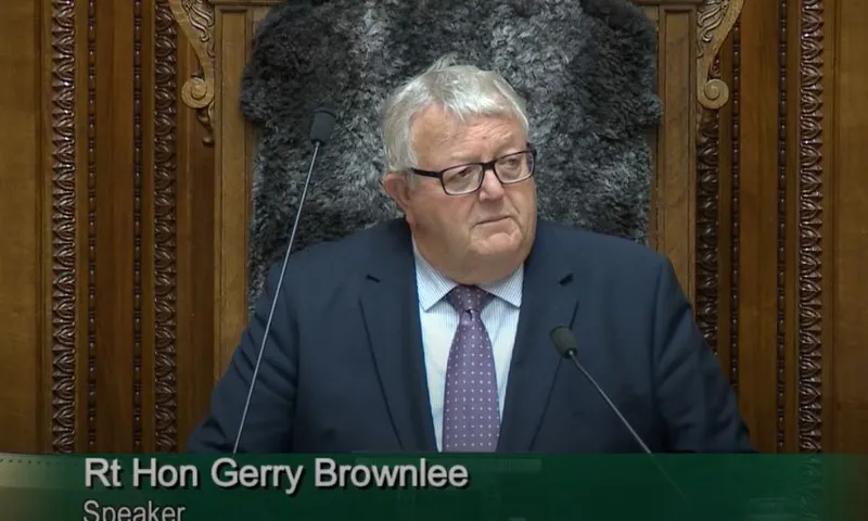 Gerry Brownlee, with tousled hair, sits in the speaker's chair.