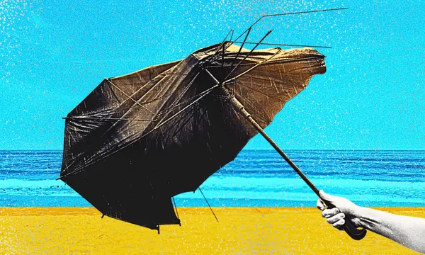 A hand holds a black, inside-out umbrella against a colorful, stylized beach background with yellow sand, blue ocean, and a bright blue sky.