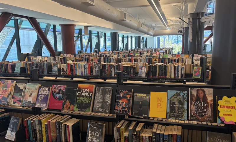 A photo of the third floor of Te Matapihi, Wellington's central library, showing rows and rows of books.