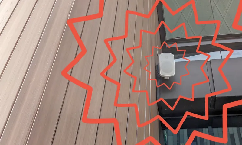 a speaker surrounded by zig zags