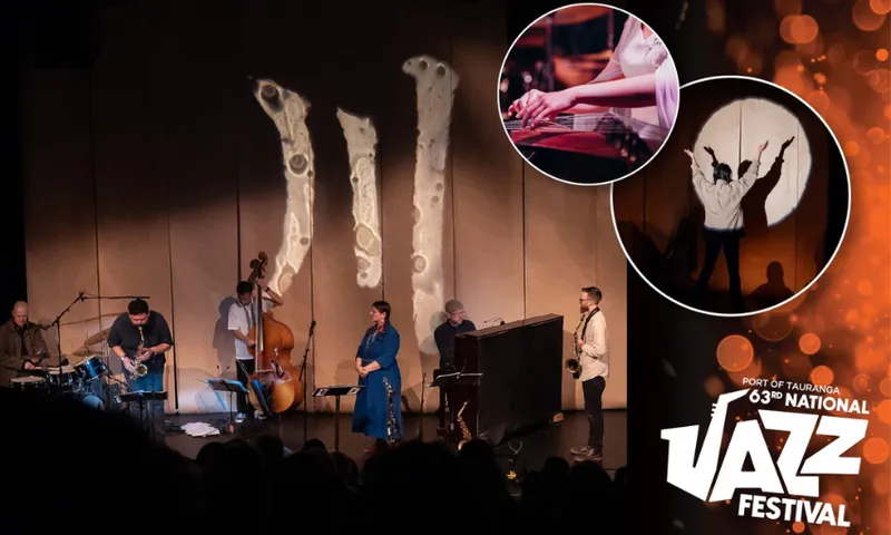 A production photo from music performance Waypeople. Musicans are on a large stage with large set items in the background.
