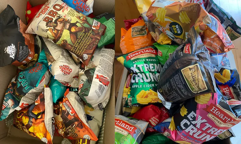 two images showing cardboard boxes overflowing with packets of chips