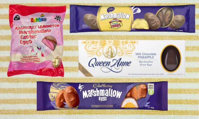 Four different brands of chocolate-covered marshmallow Easter eggs are displayed on a yellow and white striped background. The packaging features colorful designs, logos, and images of the treats inside.