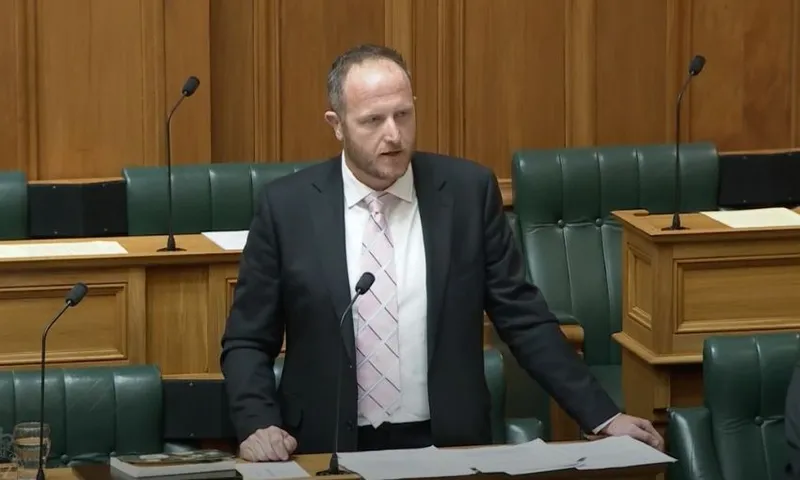 Act's Cameron Luxton stands and speaks in the House.