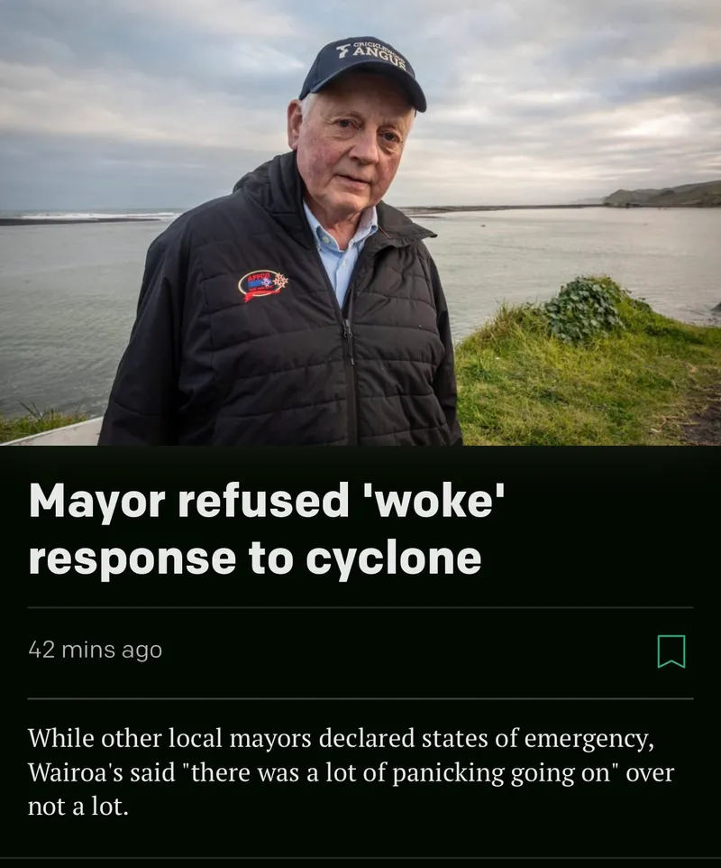 An older man in a black jacket and cap stands outdoors near water. Headline: “Mayor refused 'woke' response to cyclone.” Subheading notes he avoided panic as other mayors declared emergencies.