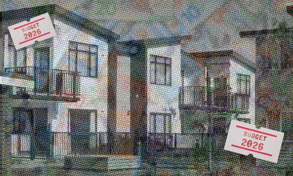 A pixelated image of modern apartment buildings overlaid with two “Budget 2026” tags and faint text and graphics in the background, creating a collage-like effect.