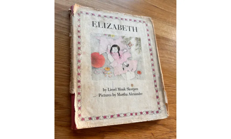A photo of an old book called Elizabeth.