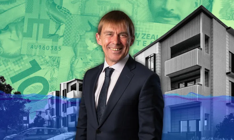 A man in a dark suit and tie smiles in front of modern buildings and large New Zealand banknotes, with a colorful graphic wave across the image.