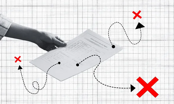 A hand holding a document over a grid background with dotted lines, arrows, and large red X marks, suggesting mistakes or errors in a process or document handling.