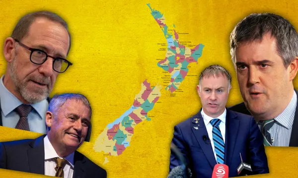 Four men in suits are arranged around a colorful map of New Zealand, set against a yellow textured background. The men appear to be politicians or public figures, and two of them are speaking at microphones.