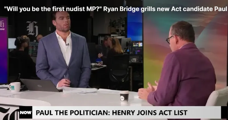 Ryan Bridge interviews Paul Henry in a newsroom studio. A headline reads, "Will you be the first nudist MP?" and a news ticker says, "PAUL THE POLITICIAN: HENRY JOINS ACT LIST.
